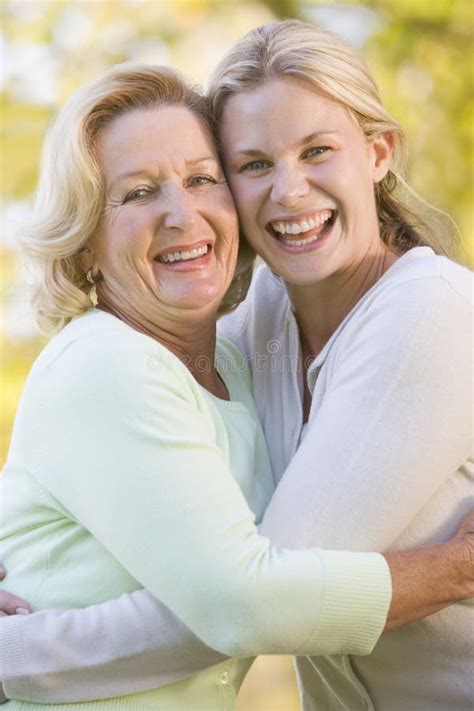 Hugging Mother And Daughter